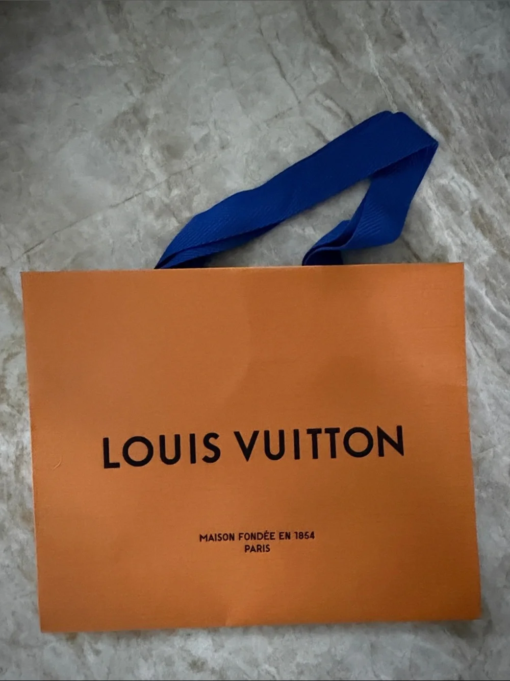 Small Louis Vuitton Orange Shopping Bag with Blue Ribbon Handles. 9X7 inches.